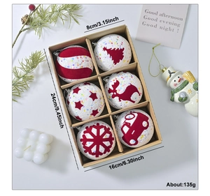 Detailed view of red and white Christmas foam ornaments with reindeer and snowflake patterns
