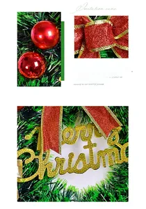 Close-up of artificial pine needles, red glitter bows and golden Merry Christmas sign