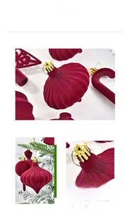 Detail of burgundy flocked Christmas ornaments with matte velvet finish and gold strings