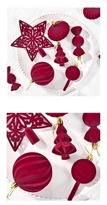 Detailed view of dark red flocked Christmas ornaments in various festive shapes