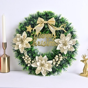Couronne de Noël avec nœud doré pailleté, renne et inscription Joyeux Noël sur fond blanc