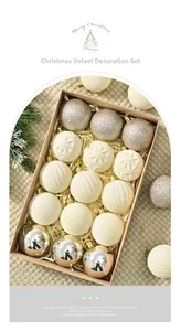 Close-up of assorted white, gold, and silver 6cm Christmas ball ornaments in a gift box
