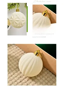 Detail of cream white flocked Christmas ball ornaments with embossed geometric textures