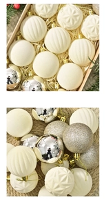 Detailed view of flocked cream and gold glitter Christmas ornaments with metallic finish