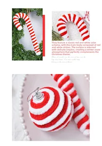 Close-up of red and white striped plush candy canes with glitter on a pine tree