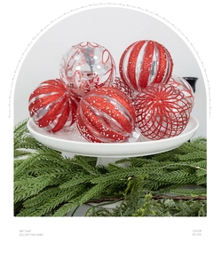 Detail of DIY transparent Christmas ornaments with red glitter and plaid patterns