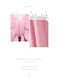 Close-up of pink velvet bow decoration showing soft texture and fine sewing detail