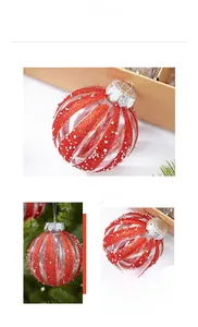 Detail of red glitter stripe clear Christmas ornament with silver embossed cap