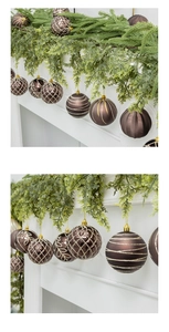 Detail of bronze Christmas ornaments with glitter stripes and geometric textures on a tree