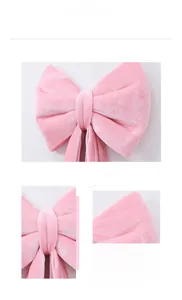 Detailed view of pink velvet bow decoration with soft texture and white hanging string