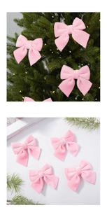 Close-up of soft pink velvet Christmas bows for tree decoration and wedding invitations