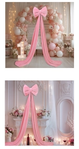 Large pink velvet bow decoration with long ribbons for wedding and birthday parties