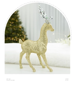 Close-up of elegant golden glitter reindeer statue with beaded antlers for Christmas decor