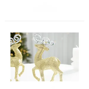 Detail of golden glitter reindeer figurine with hollowed antlers for Christmas decor
