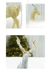 Detail of gold and silver glitter reindeer ornaments with red and white bead accents