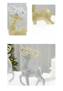 Detailed view of glittering Christmas elk ornaments with sparkling gold and silver finish