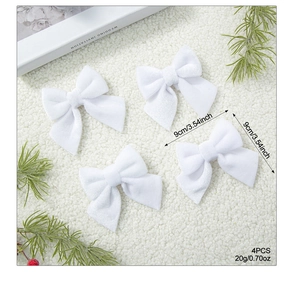 Detailed view of set of 4 white velvet bows with dimensions and 9cm width specifications