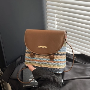Rainbow woven bucket bag with brown leather flap and shoulder strap for summer beach
