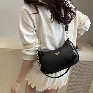 Classic black lychee pattern leather crescent shoulder bag with golden chain detail