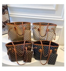 Detail of vintage patterned tote bags with matching pouches in four classic colorways
