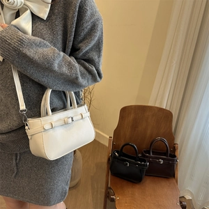 Minimalist leather handbag set in classic black, white and brown with metal buckles