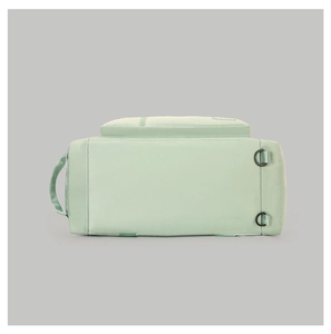 Detail of mint green waterproof travel bag with metal D-rings and sturdy nylon handles