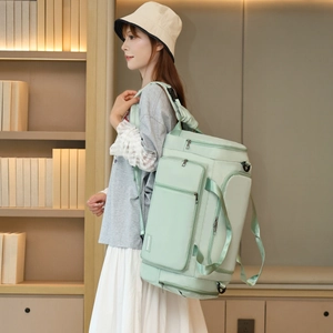 Light green fitness travel bag with shoe compartment and dry-wet separation on shelf