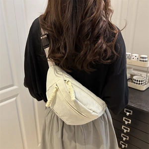 Minimalist beige corduroy crossbody chest bag for women with adjustable strap and casual style