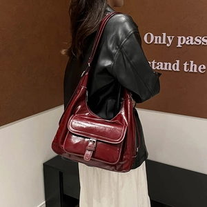 Vintage burgundy oil wax leather tote bag with white contrast stitching and metallic buckle