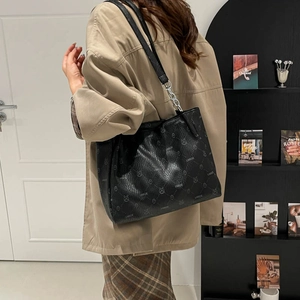 Classic large capacity black tote bag with vintage print and metal chain handle strap
