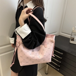 Pink faux leather tote bag with cartoon rabbit print and quilted diamond pattern