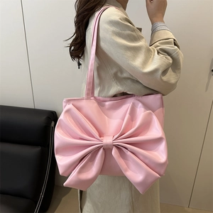 Chic pink tote bag with large bow design, spacious PU leather shoulder bag for women
