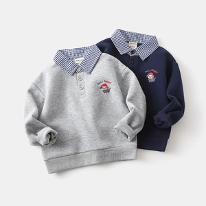 Detail of baby boys faux two-piece sweatshirt with puppy embroidery and checkered collar