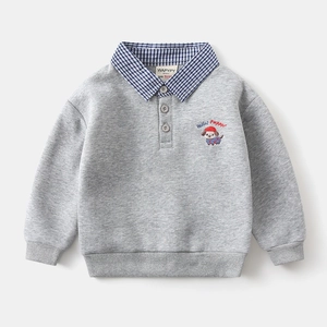 Detail of grey kid sweater with shirt collar, puppy embroidery and mock layered design