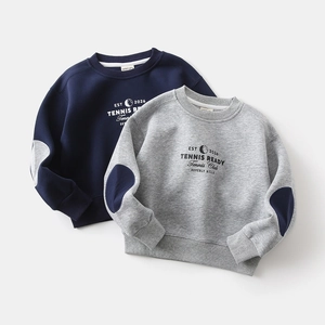 Detail of kids tennis sweatshirts featuring elbow patches and ribbed cuffs in two colors