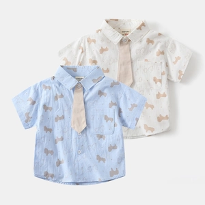 Detailed view of kids breathable cotton linen shirts with horse prints and ties