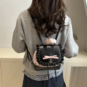 Sweet black leather mini backpack with pink lace floral trim and bow detail for girls