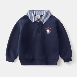 Detail of navy blue boys' polo sweatshirt with checkered collar and puppy embroidery