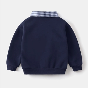 Detail of dark blue children sweatshirt with navy plaid mock collar and ribbed cuffs