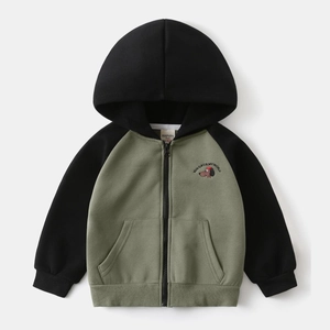 Detail of embroidered puppy and text on olive and black hooded zip-up jacket
