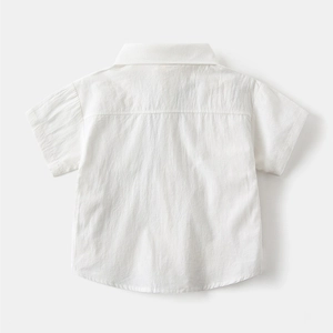 Back view of classic white cotton short-sleeve shirt for boys with minimalist yoke detail