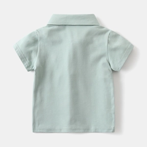 Back view of mint green toddler boys polo shirt showing cotton texture and lapel design