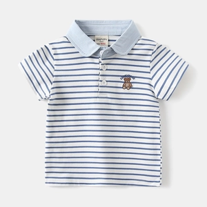 Detailed flat lay of blue striped boys' polo shirt with bear embroidery and light blue collar