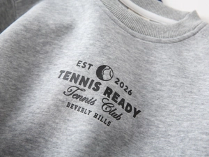 Detail of gray cotton sweatshirt neck and vintage Beverly Hills tennis club print