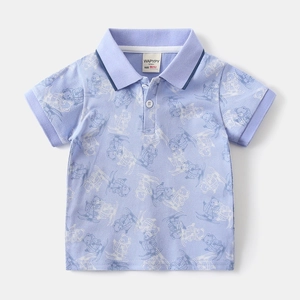 Detail of baby boy polo shirt with bear print and branded woven neck label and size tag