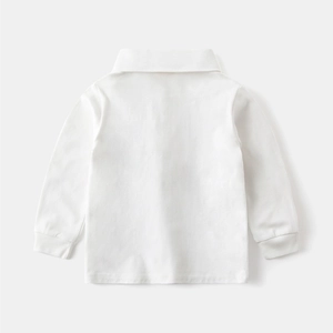 Rear view of white kids polo shirt featuring classic turn-down collar and ribbed cuffs