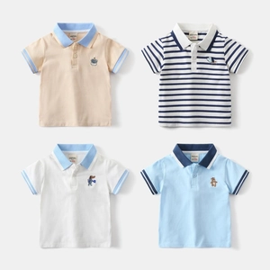 Close-up of assorted toddler polo shirts featuring cute animal embroidery and striped collars
