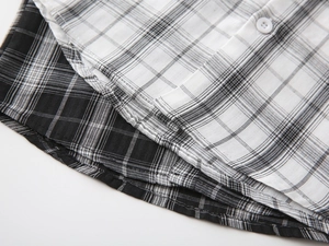 Close-up of boys plaid shirts showing breathable cotton texture and resin button detail