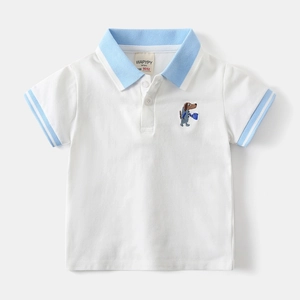 Detail of baby boy white polo shirt featuring cute puppy embroidery and striped collar