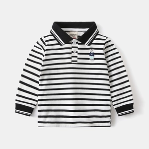 Detail of embroidered bear on black and white striped cotton long sleeve polo shirt